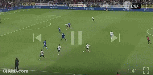 A Soccer Game Is Being Played In A Stadium With A Banner That Says Camiones GIF