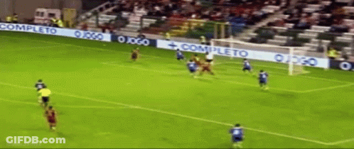 A Soccer Game Is Being Played In A Stadium With A Banner That Says Completo GIF