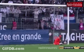 A Soccer Game Is Being Played In A Stadium With A Banner That Says ' Free En Grande ' On It GIF