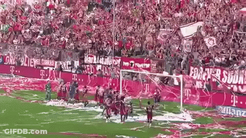 A Soccer Game Is Being Played In A Stadium With A Lot Of Fans GIF