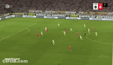 A Soccer Game Is Being Played In A Stadium With Ads For Daen Bund GIF