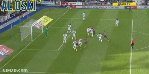 A Soccer Game Is Being Played In A Stadium With Ads For Stanley And Sky GIF
