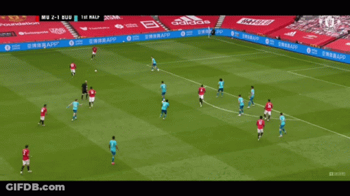 A Soccer Game Is Being Played In A Stadium With Ads For Yobo GIF
