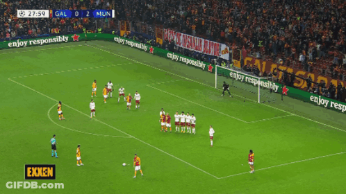 A Soccer Game Is Being Played In A Stadium With Advertisements For Enjoy Responsibly GIF