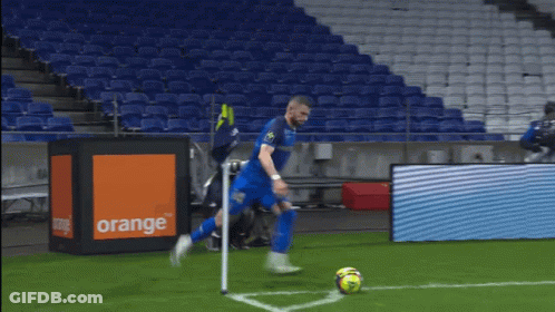 A Soccer Game Is Being Played In An Empty Stadium With Emirates Fly Better Advertisements On The Sidelines GIF