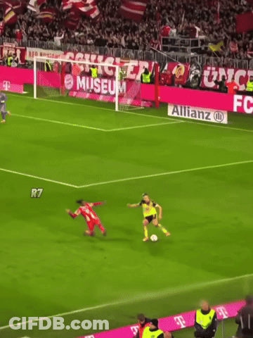 A Soccer Game Is Being Played In Front Of A Banner For Fc Bayer GIF
