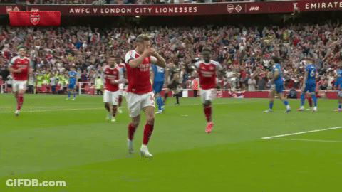 A Soccer Game Is Being Played In Front Of A Banner That Says Awfc V London City Lionesses GIF