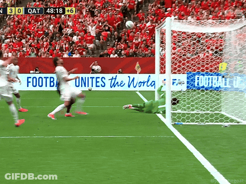 A Soccer Game Is Being Played In Front Of A Banner That Says " Football Unites The World " GIF