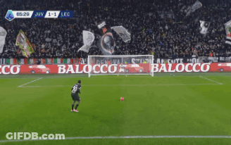 A Soccer Game Is Being Played In Front Of A Banner That Says Juventus GIF
