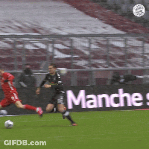 A Soccer Game Is Being Played In Front Of A Banner That Says " Manches " GIF