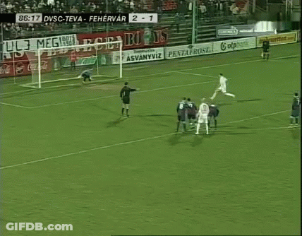 A Soccer Game Is Being Played In Front Of A Banner That Says Naplo GIF