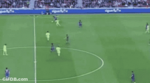 A Soccer Game Is Being Played In Front Of A Banner That Says Nike Football.com GIF