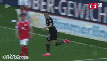 A Soccer Game Is Being Played In Front Of A Banner That Says Ober-Gemich GIF
