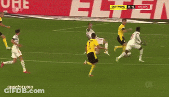 A Soccer Game Is Being Played In Front Of A Banner That Says " Sportstudio " GIF