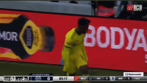 A Soccer Game Is Being Played In Front Of A Bodya Advertisement GIF
