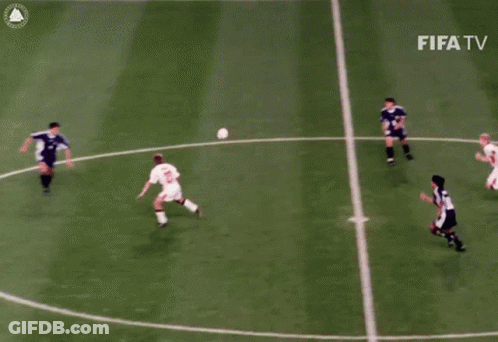 A Soccer Game Is Being Played In Front Of A Canon Advertisement GIF