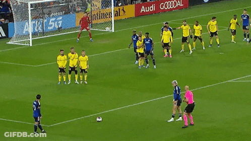 A Soccer Game Is Being Played In Front Of A Continental Ad GIF