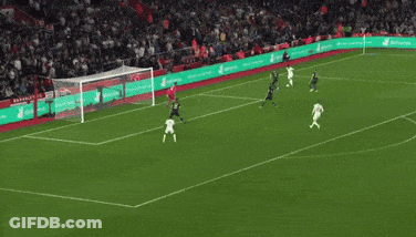 A Soccer Game Is Being Played In Front Of A Crowd With A Banner That Says Allianz On It GIF