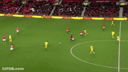 A Soccer Game Is Being Played In Front Of A Crowd With A Sign That Says ' Allianz ' On It GIF