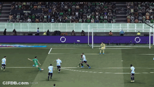 A Soccer Game Is Being Played In Front Of A Crowd With Replay Written On A Banner GIF