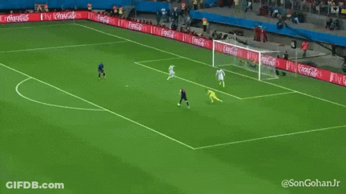 A Soccer Game Is Being Played In Front Of A Fly Emirates Sign GIF
