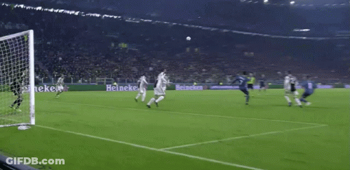 A Soccer Game Is Being Played In Front Of A Heineken Sign GIF