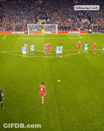 A Soccer Game Is Being Played In Front Of A Large Crowd And A Sign That Says ' Fast & Furious ' GIF