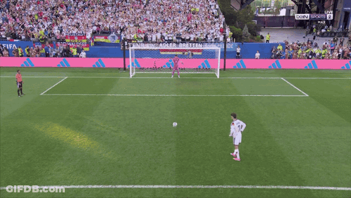 A Soccer Game Is Being Played In Front Of A Large Crowd And The Score Is 0-0 GIF