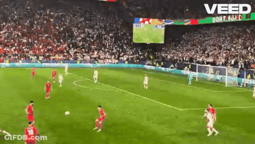 A Soccer Game Is Being Played In Front Of A Large Crowd And The Word Veed Is On The Screen GIF