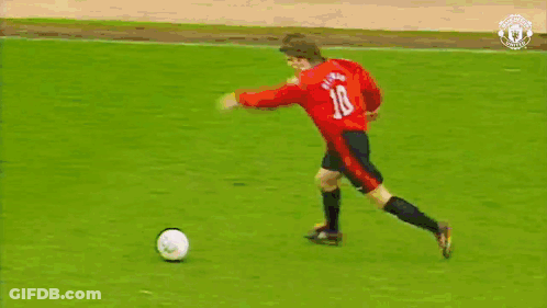 A Soccer Game Is Being Played In Front Of A Mcdonald 'S Ad GIF