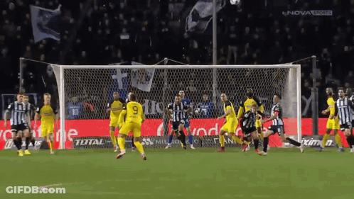 A Soccer Game Is Being Played In Front Of A Nova Sports Sign GIF