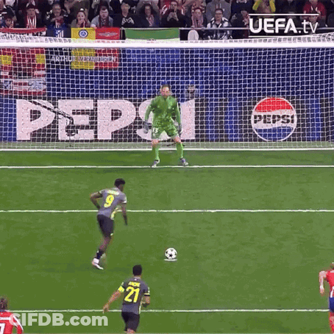 A Soccer Game Is Being Played In Front Of A Pepsi Advertisement GIF