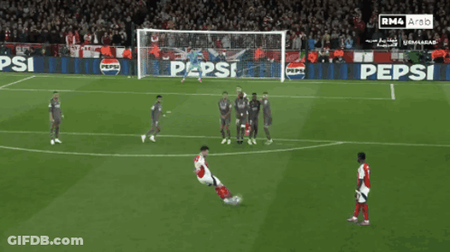 A Soccer Game Is Being Played In Front Of A Pepsi Banner GIF