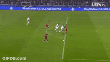 A Soccer Game Is Being Played In Front Of A Playstation Advertisement GIF