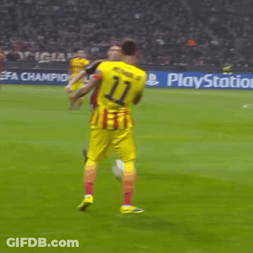 A Soccer Game Is Being Played In Front Of A Playstation Banner GIF