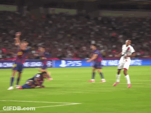 A Soccer Game Is Being Played In Front Of A Ps5 Ad GIF