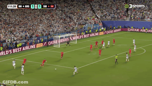 A Soccer Game Is Being Played In Front Of A Qatar Airways Ad GIF