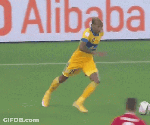 A Soccer Game Is Being Played In Front Of A Sign That Says Alibaba Cloud GIF