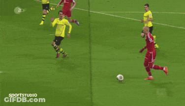 A Soccer Game Is Being Played In Front Of A Sign That Says Brixen GIF