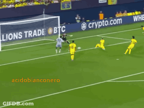 A Soccer Game Is Being Played In Front Of A Sign That Says Btc GIF
