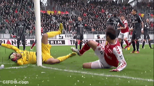 A Soccer Game Is Being Played In Front Of A Sign That Says Emirates GIF