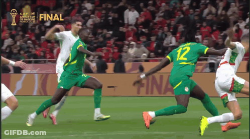 A Soccer Game Is Being Played In Front Of A Sign That Says Final GIF