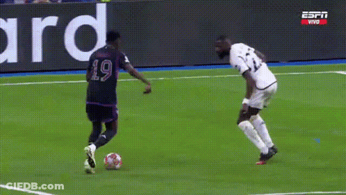 A Soccer Game Is Being Played In Front Of A Sign That Says Mastercard GIF