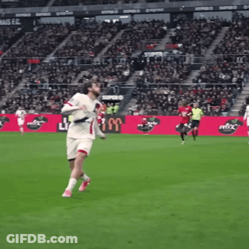 A Soccer Game Is Being Played In Front Of A Sign That Says Supra GIF