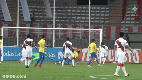 A Soccer Game Is Being Played In Front Of A Sign That Says Todaslas GIF