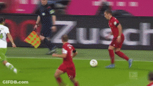 A Soccer Game Is Being Played In Front Of A Sign That Says Zusch GIF