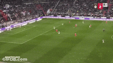 A Soccer Game Is Being Played In Front Of A Sportsstudio Advertisement GIF