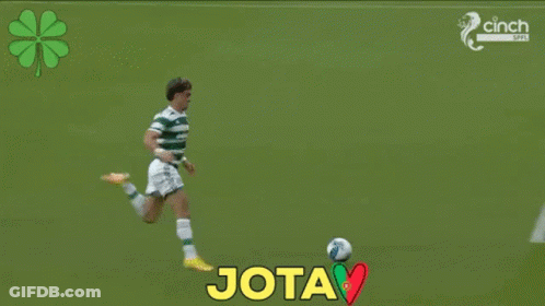 A Soccer Game Is Being Played In Front Of An Advertisement For Magners Beer GIF