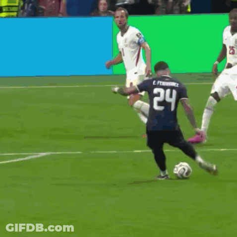 A Soccer Game Is Being Played In Front Of An Aramco Banner GIF