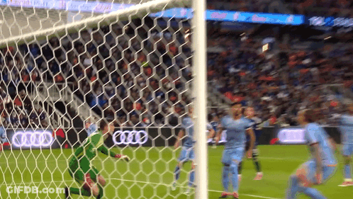 A Soccer Game Is Being Played In Front Of An Audi Sign GIF
